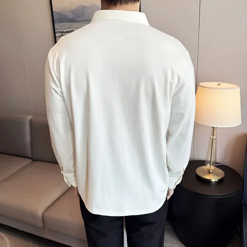 back view of model wearing dress shirt polo to show off the smooth fabric and clean aesthetic