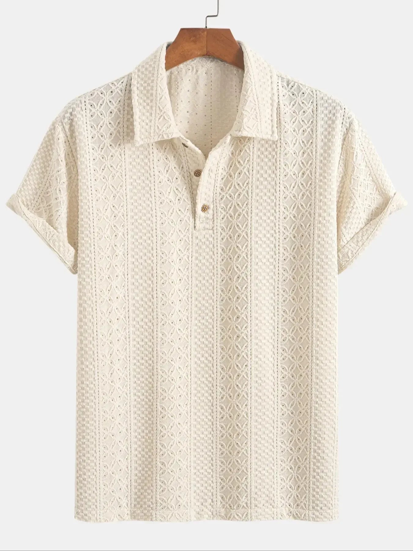 Beige patterned polo shirt on a hanger against a white background