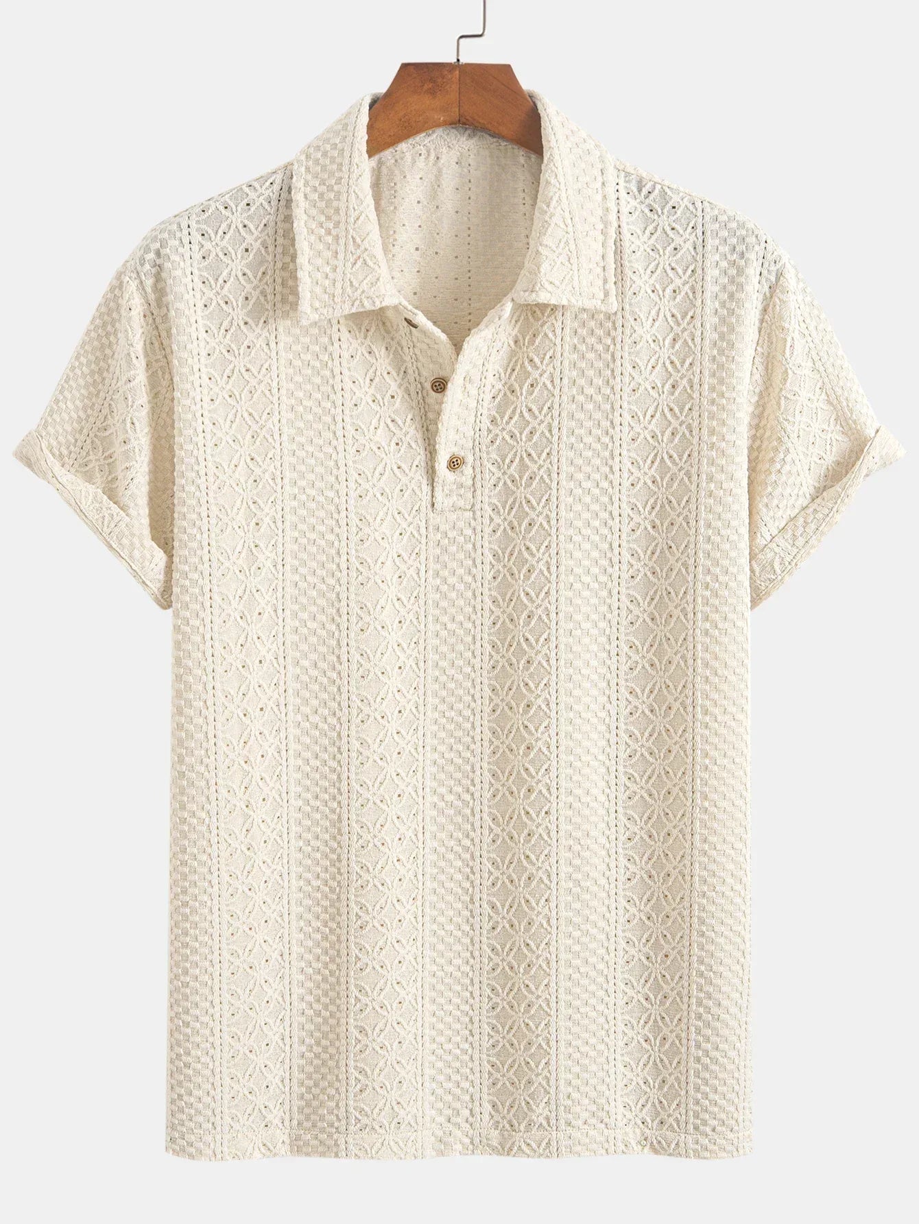 Beige patterned polo shirt on a hanger against a white background