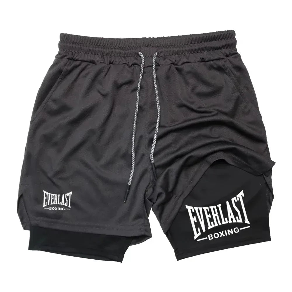 Black athletic shorts with Everlast Boxing logo on a white background