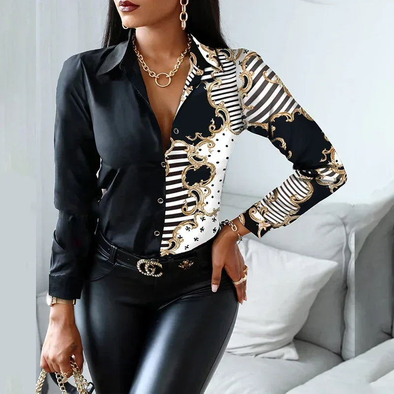 Woman wearing a black and gold patterned blouse with a white background