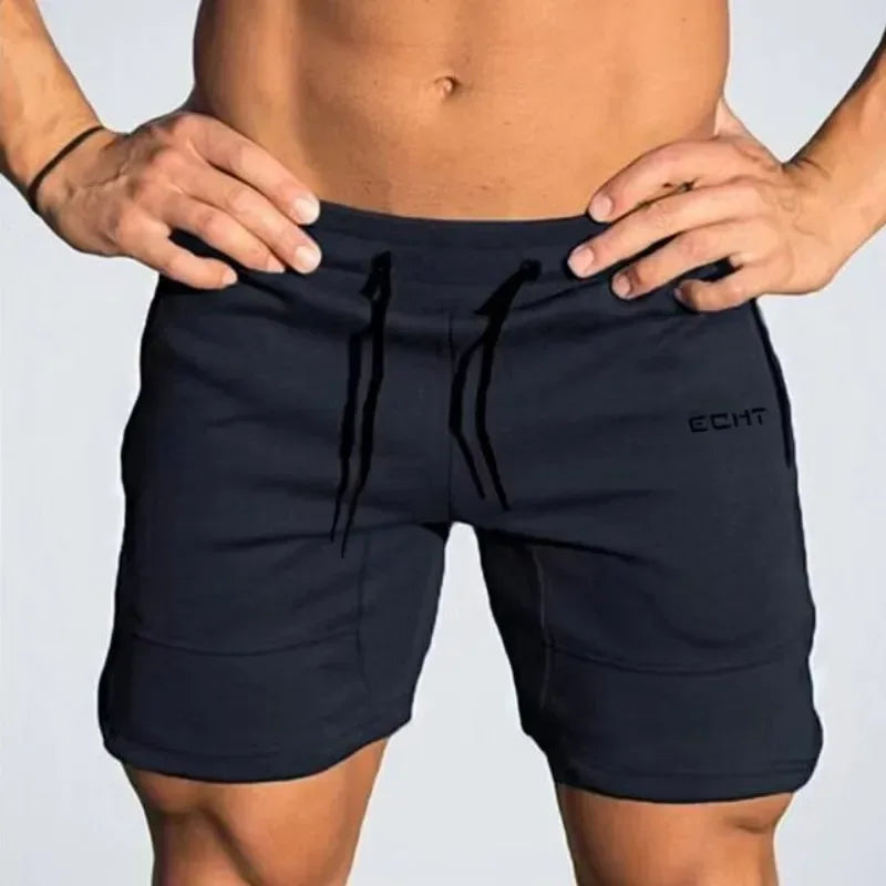 Navy blue shorts with a brand logo on a plain background