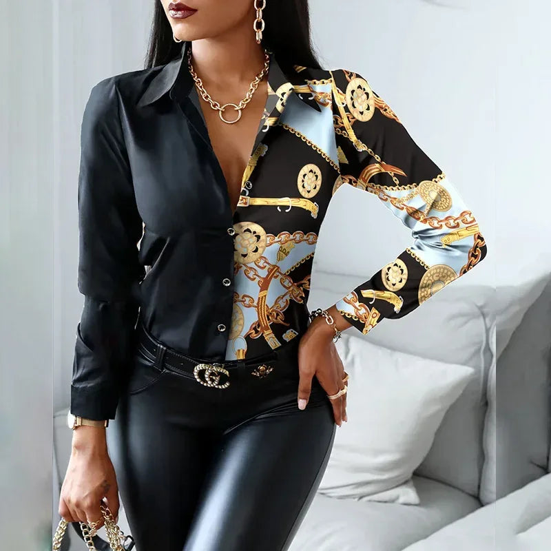 Woman wearing a black and gold patterned blouse with a white background