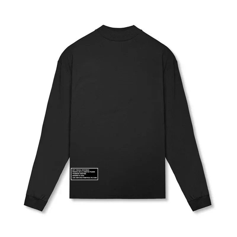 Black long-sleeve shirt with a small label on the back against a white background