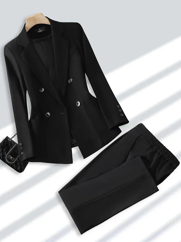 Black suit jacket and pants on a white background