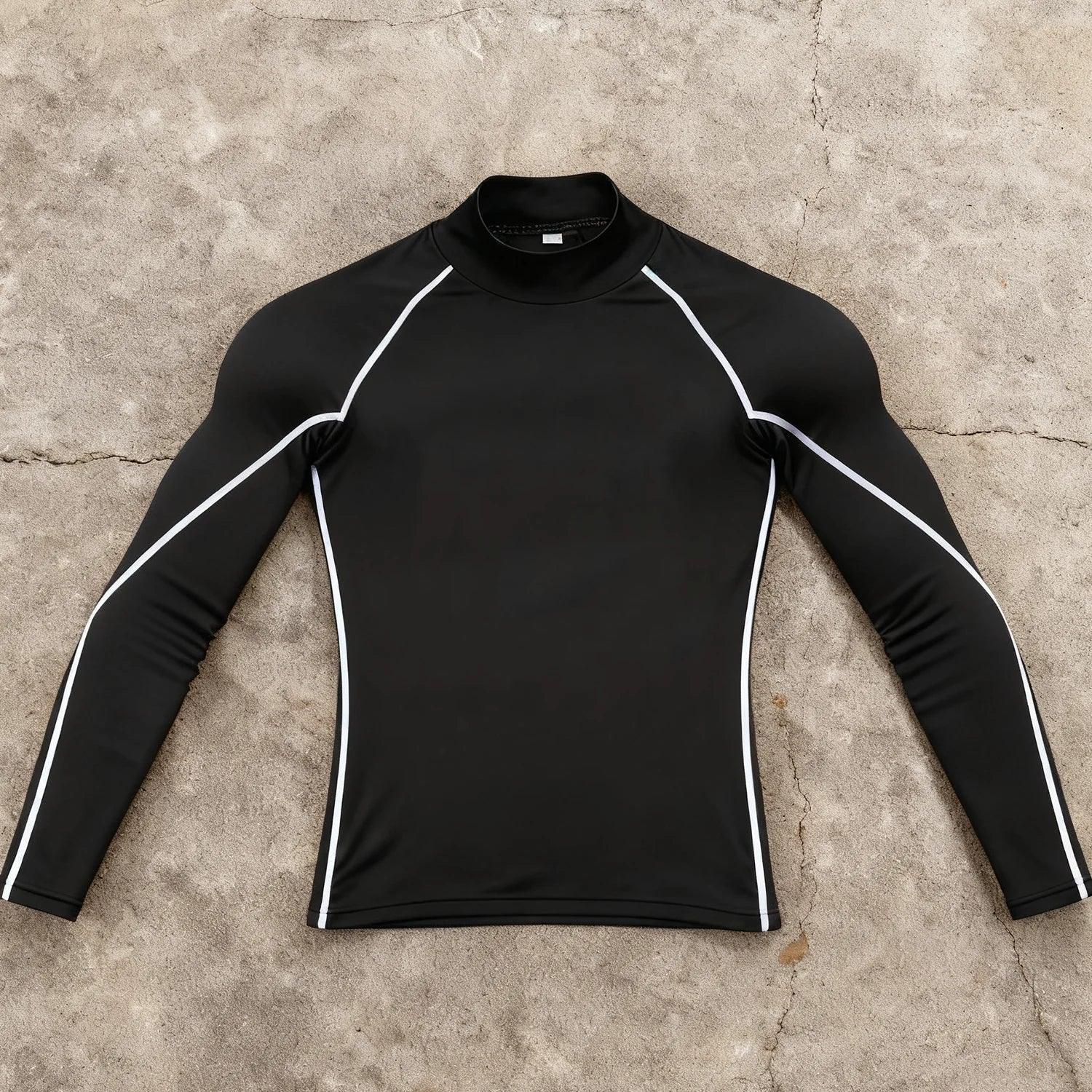 Black long-sleeve shirt with white accents on a concrete floor