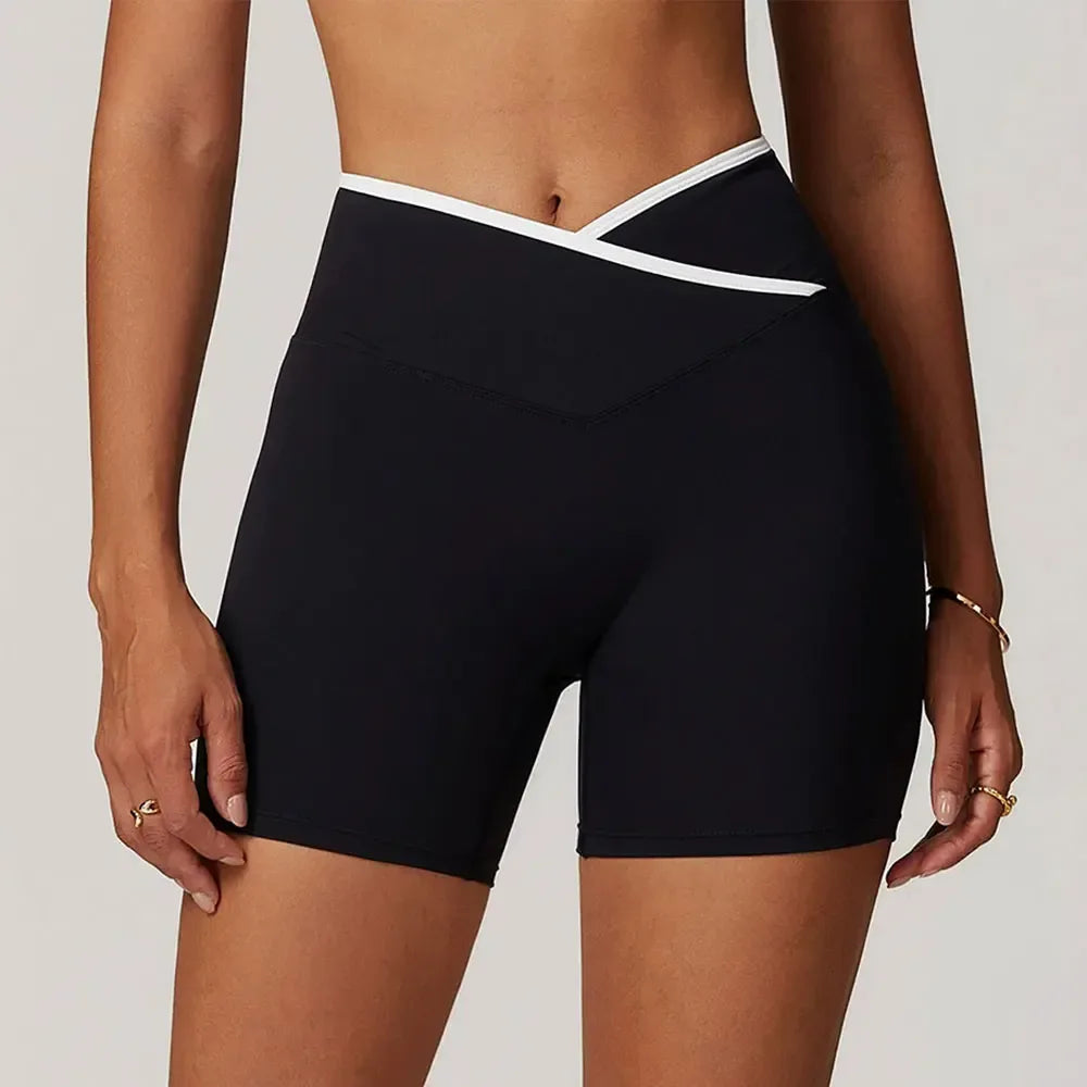 black Front view of women’s crossover high-waisted shorts featuring a slimming V-waist design - BetterPlace