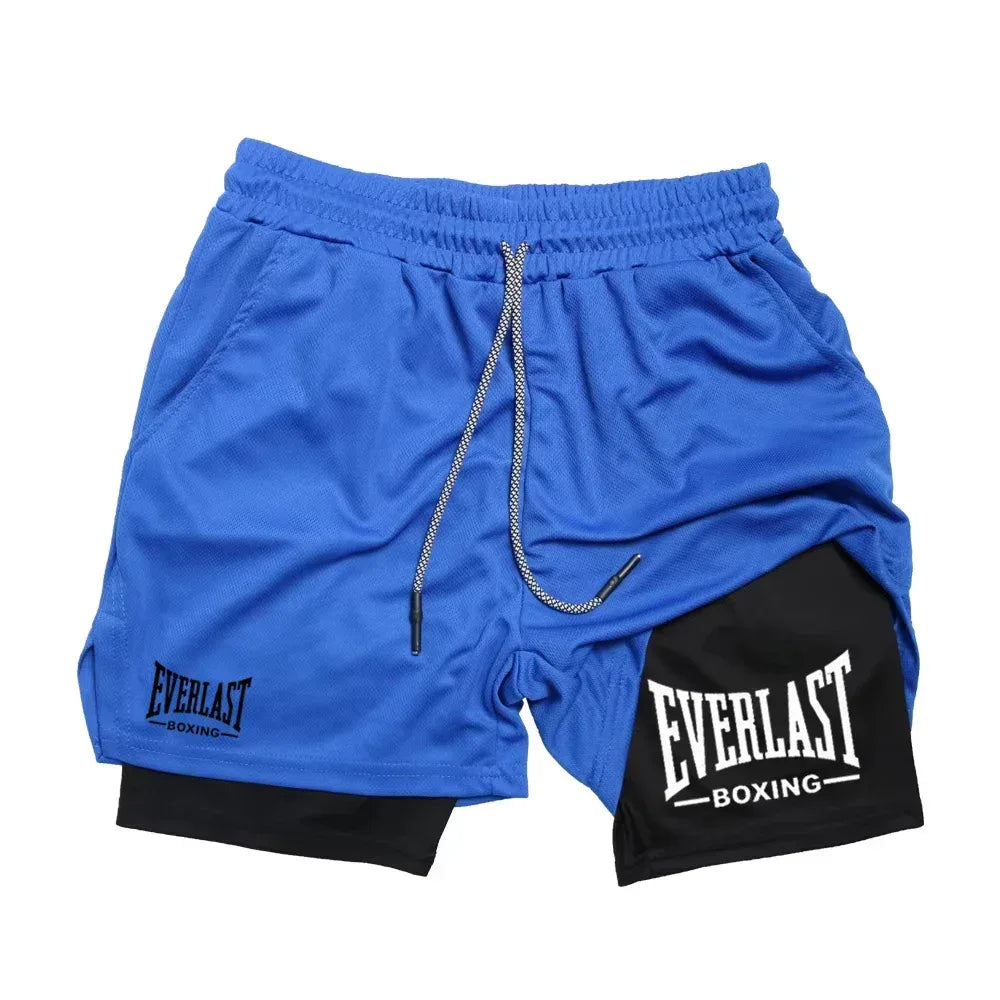 Blue and black athletic shorts with 'Everlast Boxing' branding on a white background