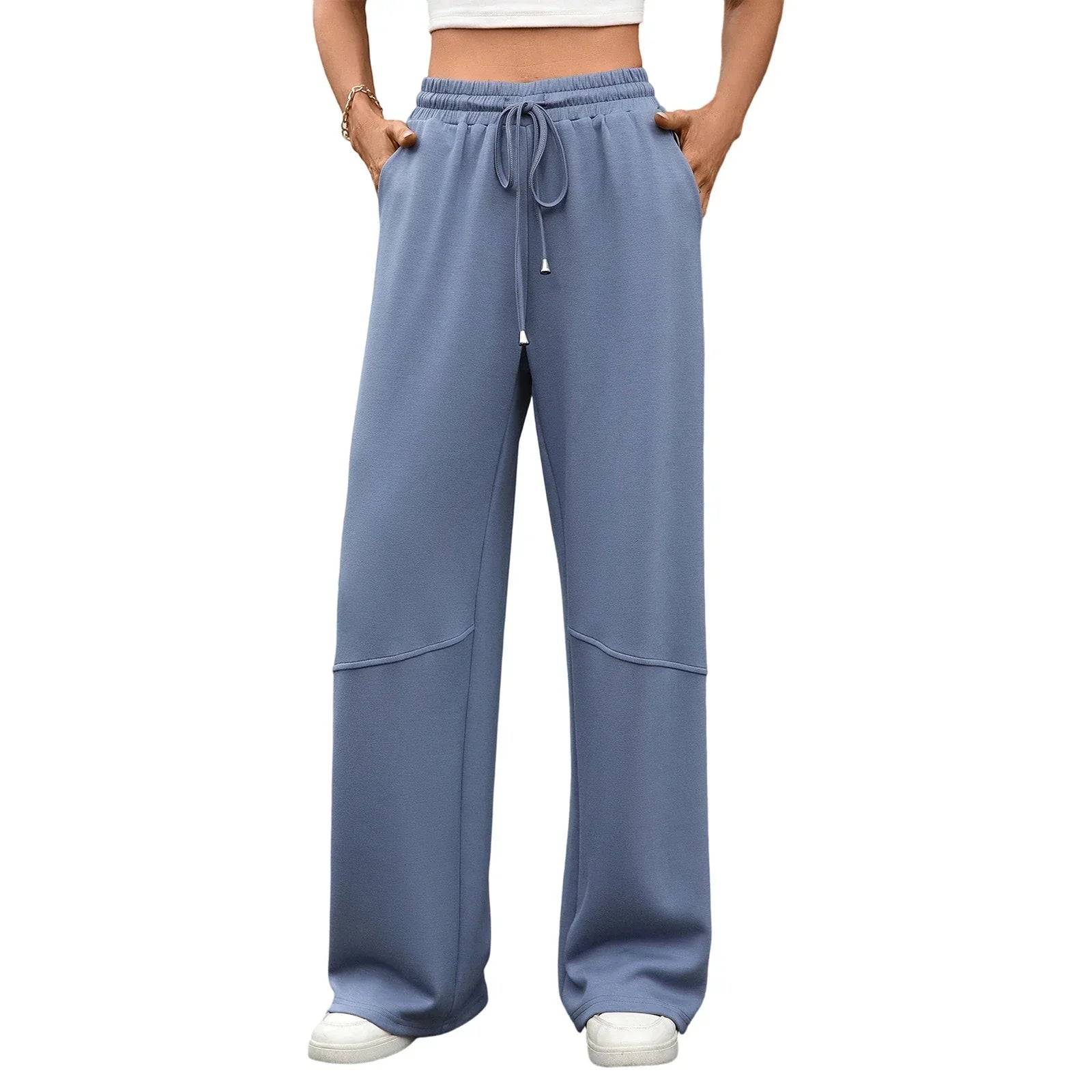 Blue wide-leg pants worn by a person on a white background