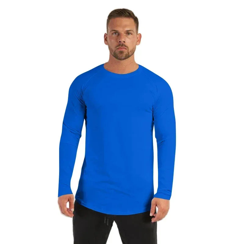 Man wearing a blue long-sleeve shirt on a white background