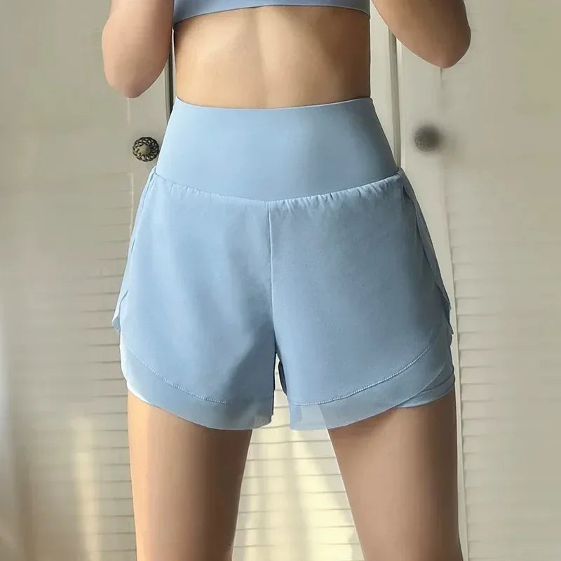  blue Front view of women’s 2-in-1 running shorts showing the breathable outer layer and high-waisted fit - BetterPlace