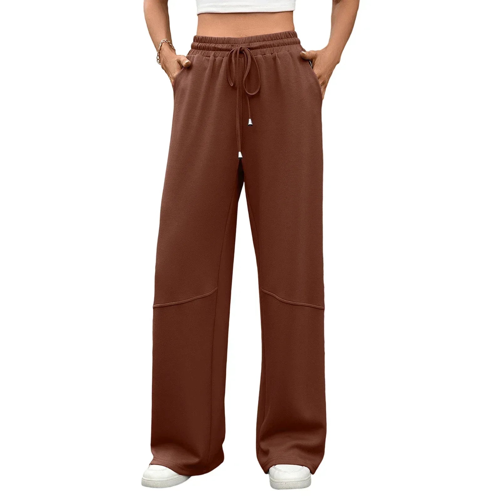 Brown wide-leg pants worn by a person on a white background