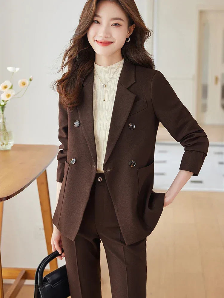 Woman wearing a brown suit in an indoor setting