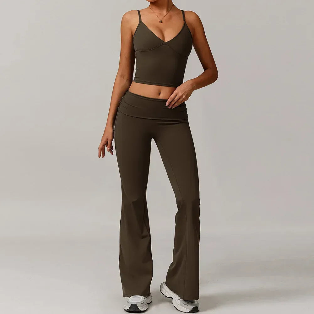 Woman wearing a chocolate brown v-neck tank top and high waisted wide leg flared leggings for a seamless athleisure yoga outfit - BetterPlace