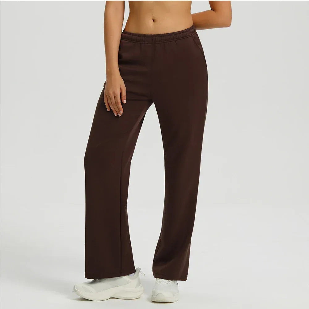 chocolate brown Front view of women's high-waisted baggy joggers featuring an oversized fit and functional deep pockets - BetterPlace
