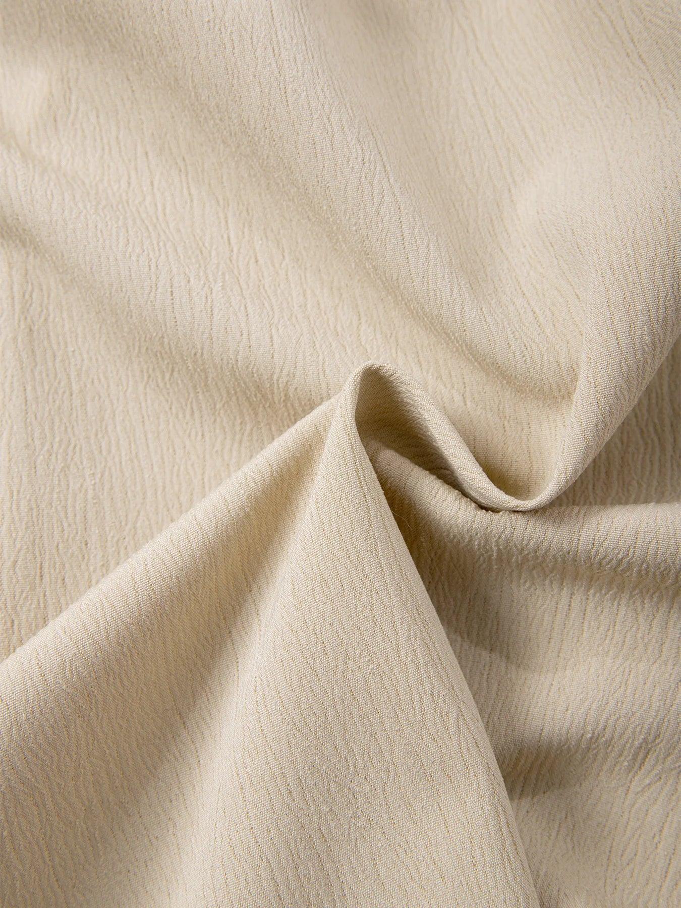 Close-up of beige fabric with a soft texture