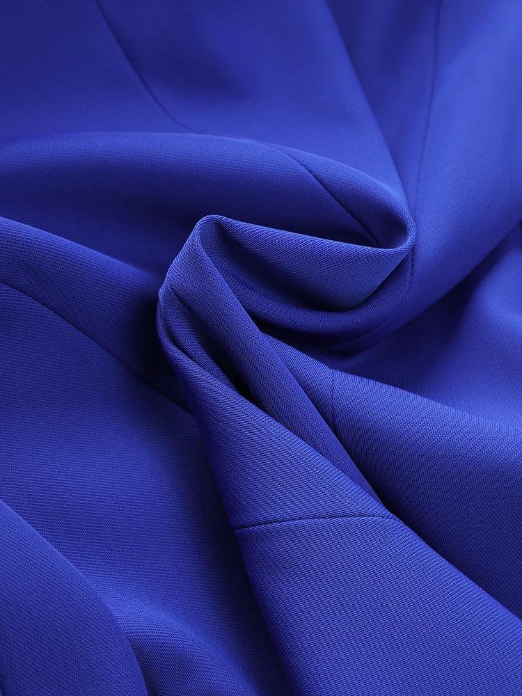 Close-up of blue fabric with folds