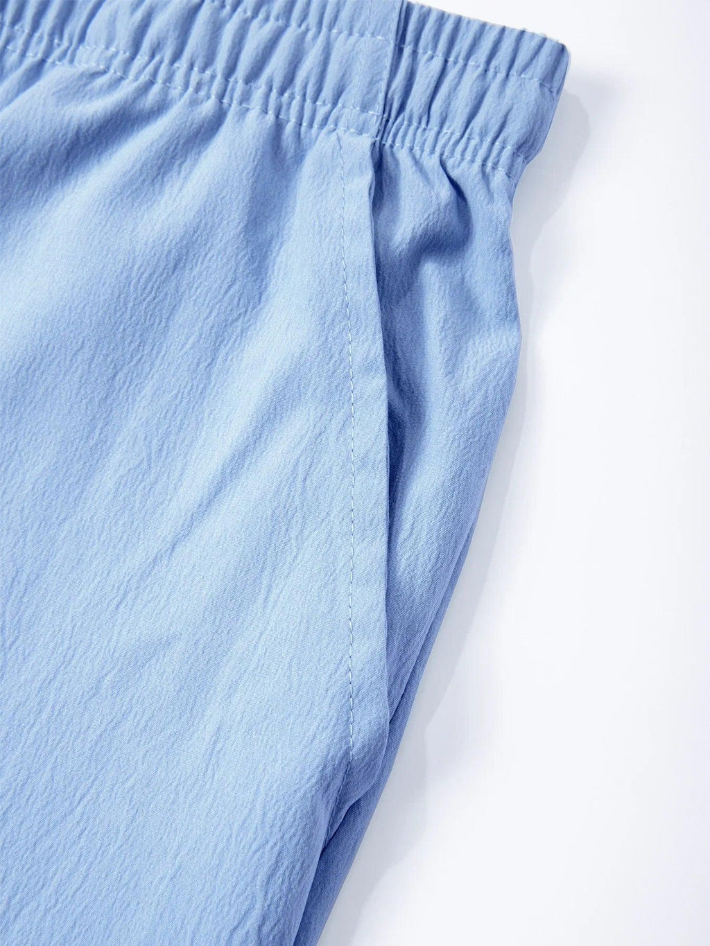 Light blue pants on a white background