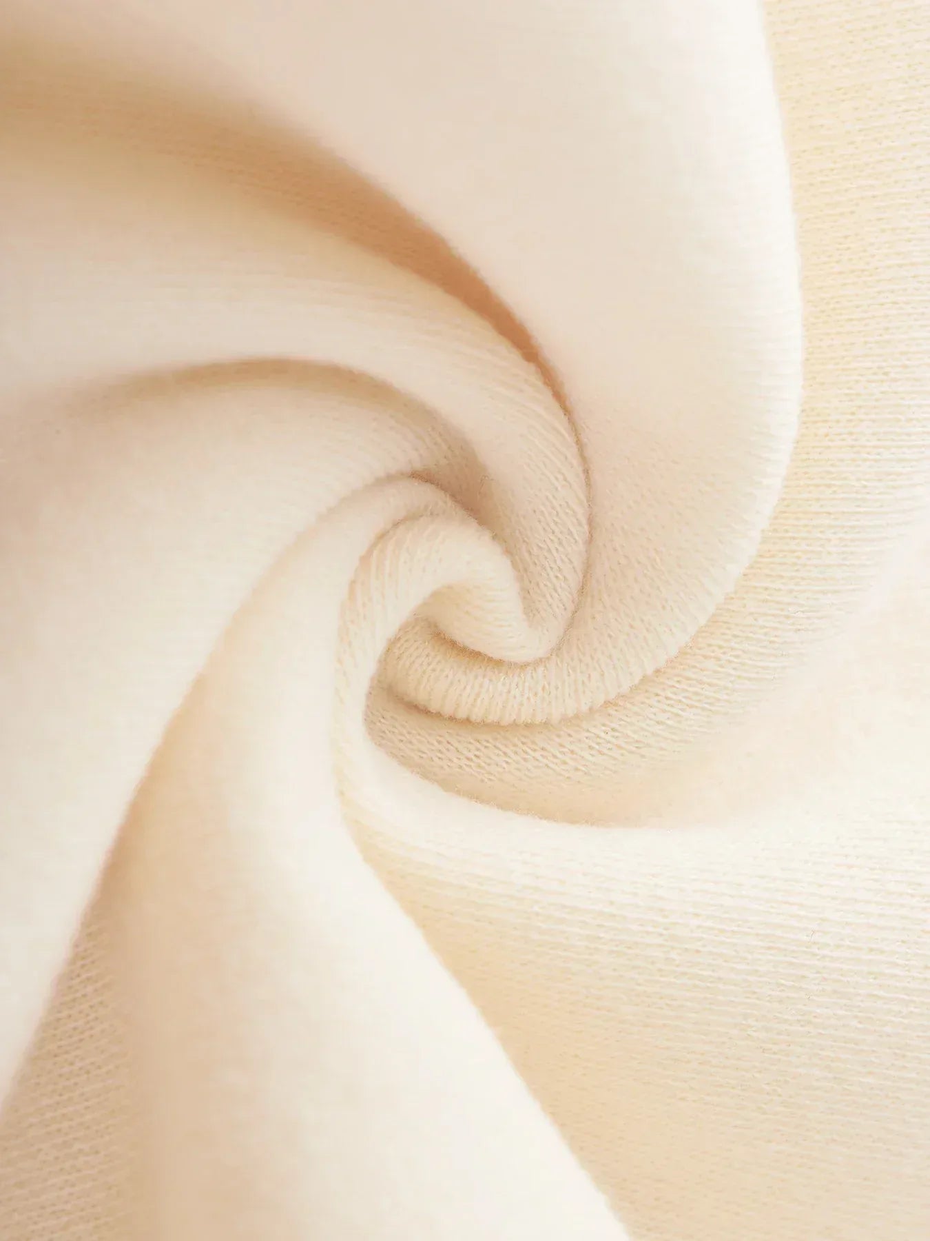 Close-up of beige fabric with a soft texture