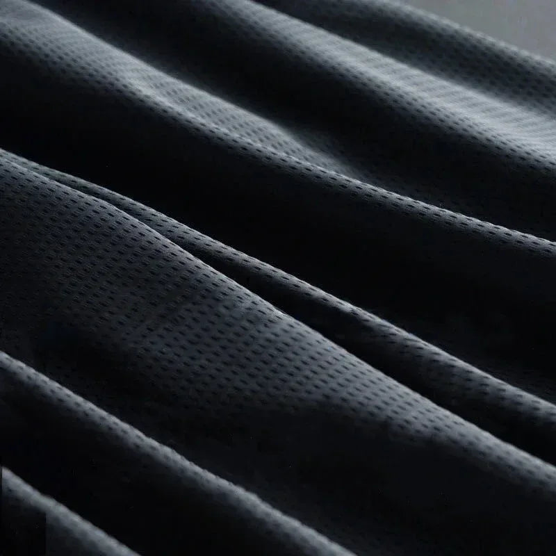 Close-up of dark gray textured fabric