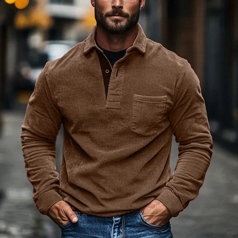 Man wearing a brown corduroy shirt on a city street