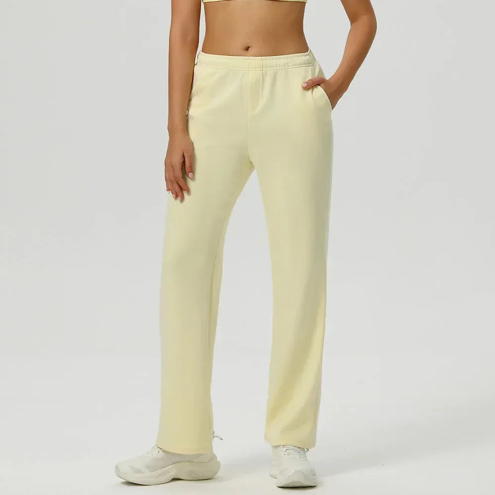 Front view of women's high-waisted baggy joggers featuring an oversized fit and functional deep pockets - BetterPlace