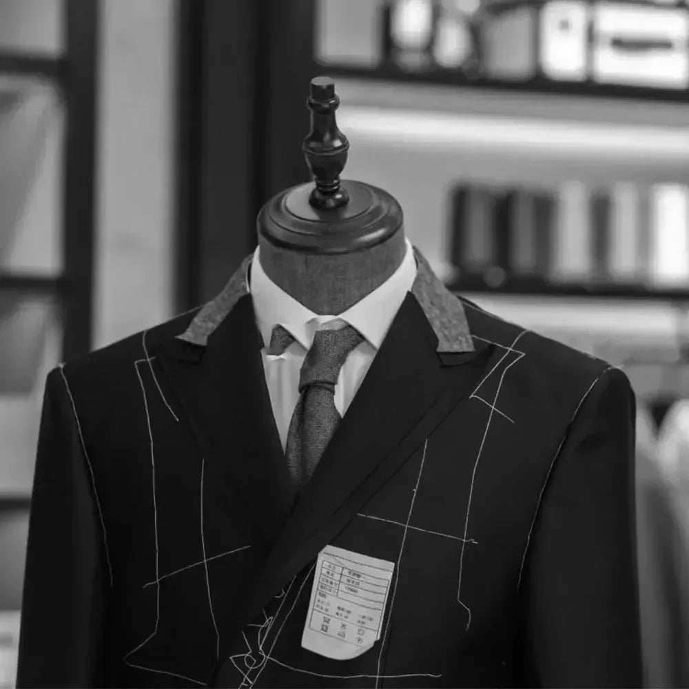 Professional mannequin display showing a 3-piece suit styled with a classic necktie for a traditional wedding or office look. - BetterPlace
