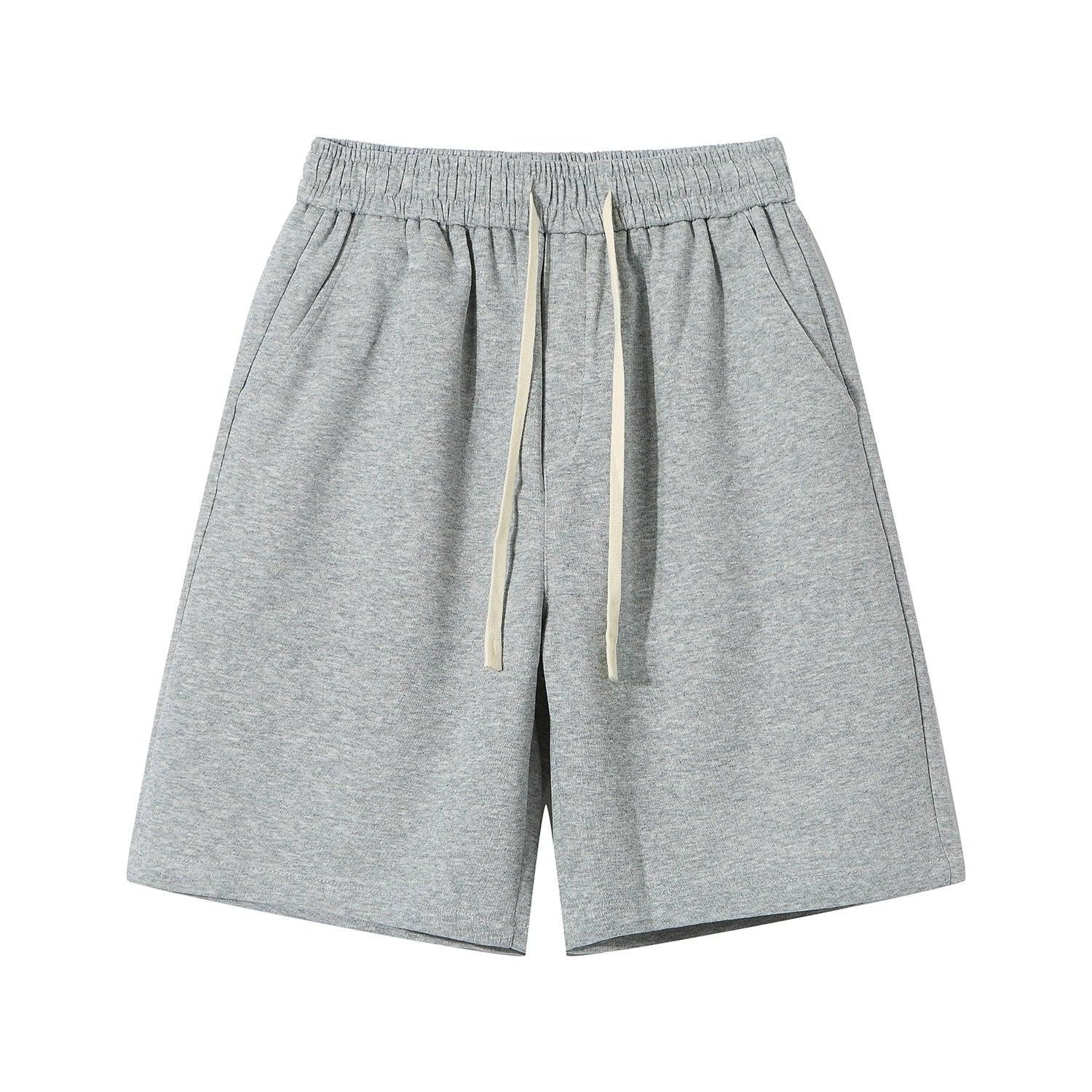Gray shorts with a drawstring on a white background