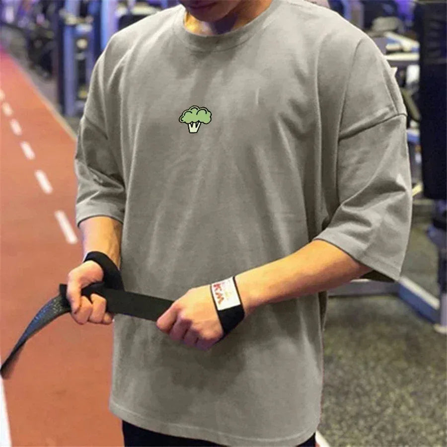 Person holding a resistance band in a gym setting