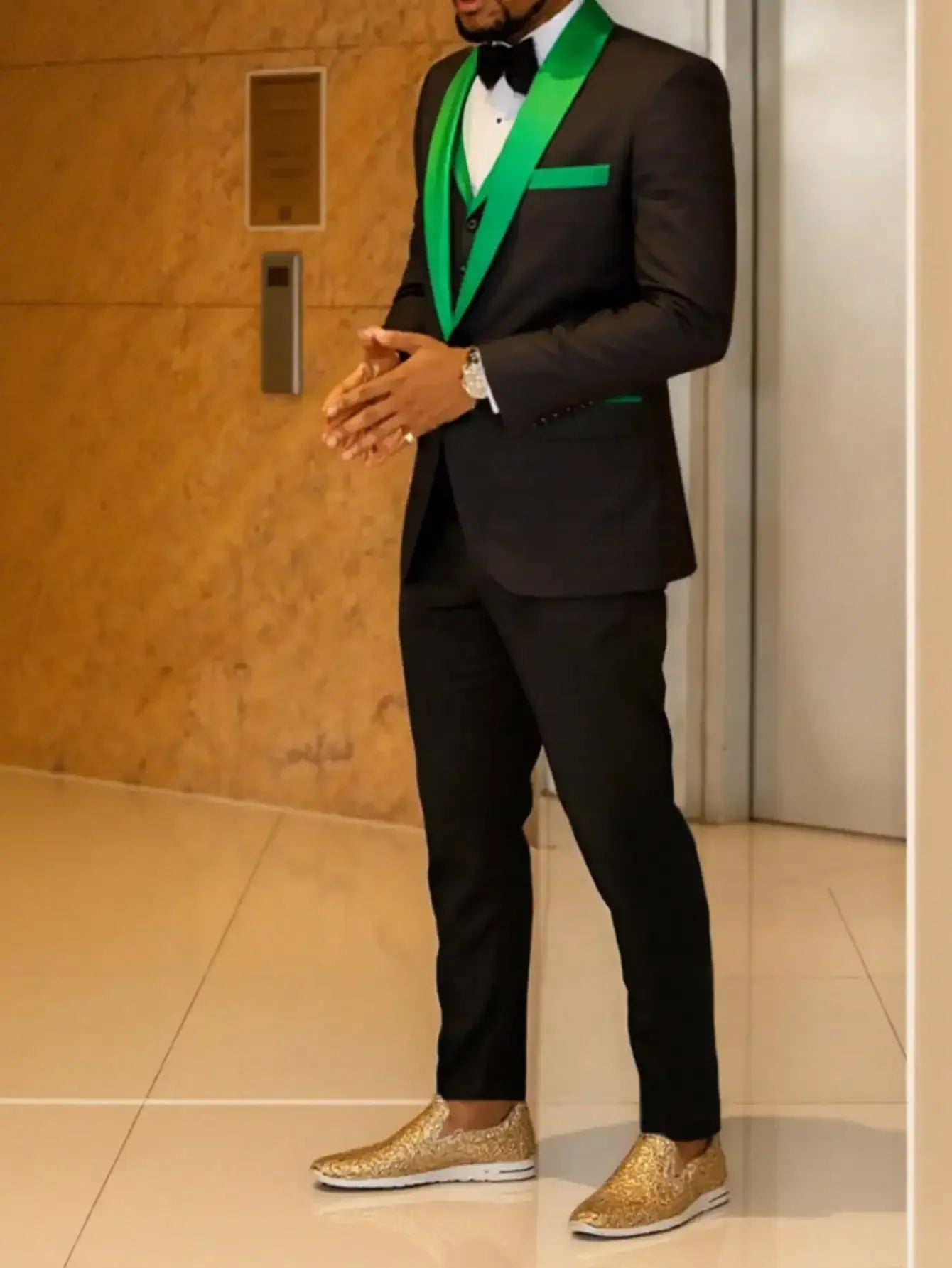 Model wearing a three piece slim fit tuxedo for a formal wedding event or black tie gala - BetterPlace
