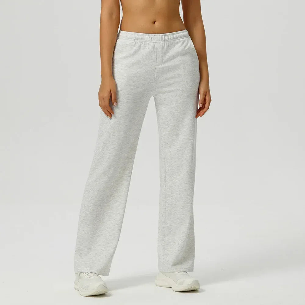 light gray Front view of women's high-waisted baggy joggers featuring an oversized fit and functional deep pockets - BetterPlace