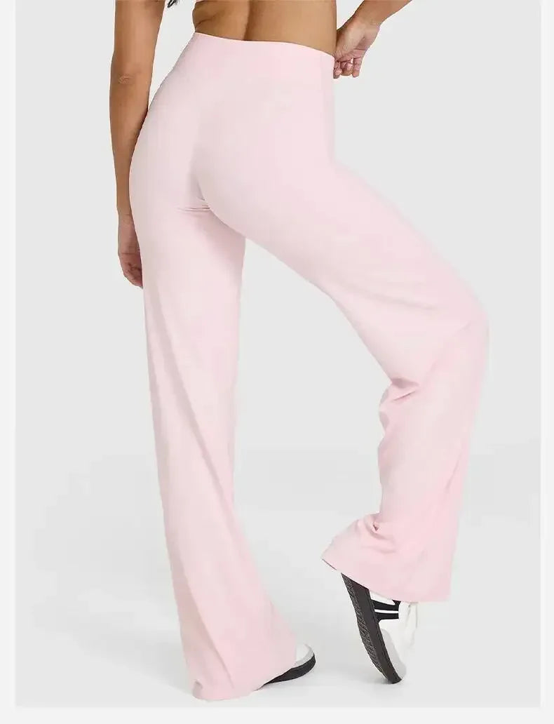 light pink Back view of women's athletic set highlighting the waistband support and seamless finish- BetterPlace
