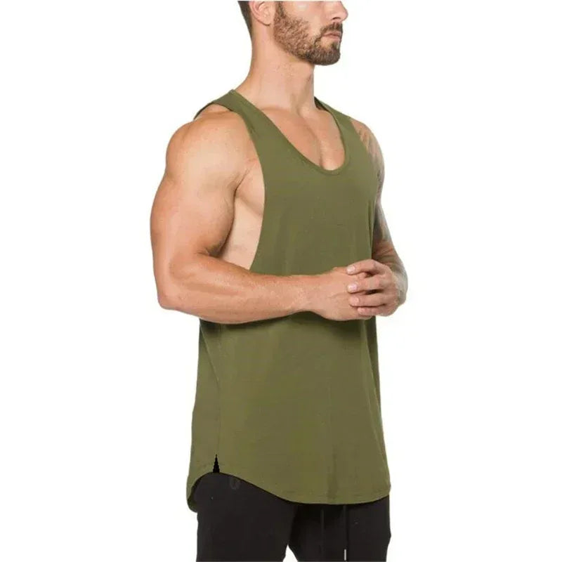 Man wearing a green tank top on a white background