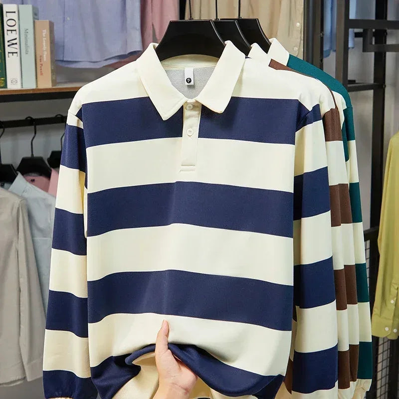 Striped long-sleeve shirt on a hanger with a blurred store background