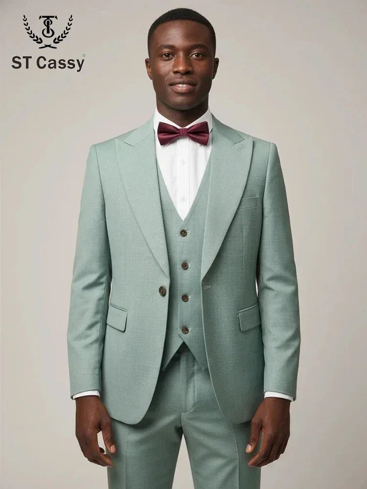 Front view of a man wearing a premium emerald green slim fit 3-piece suit with a matching vest and trousers for a wedding. - BetterPlace
