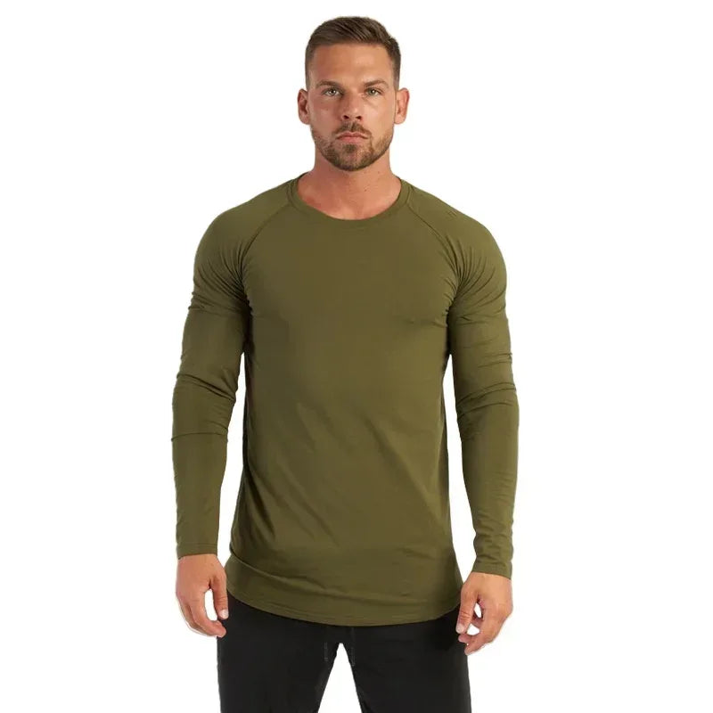 Man wearing an olive green long-sleeve shirt on a white background