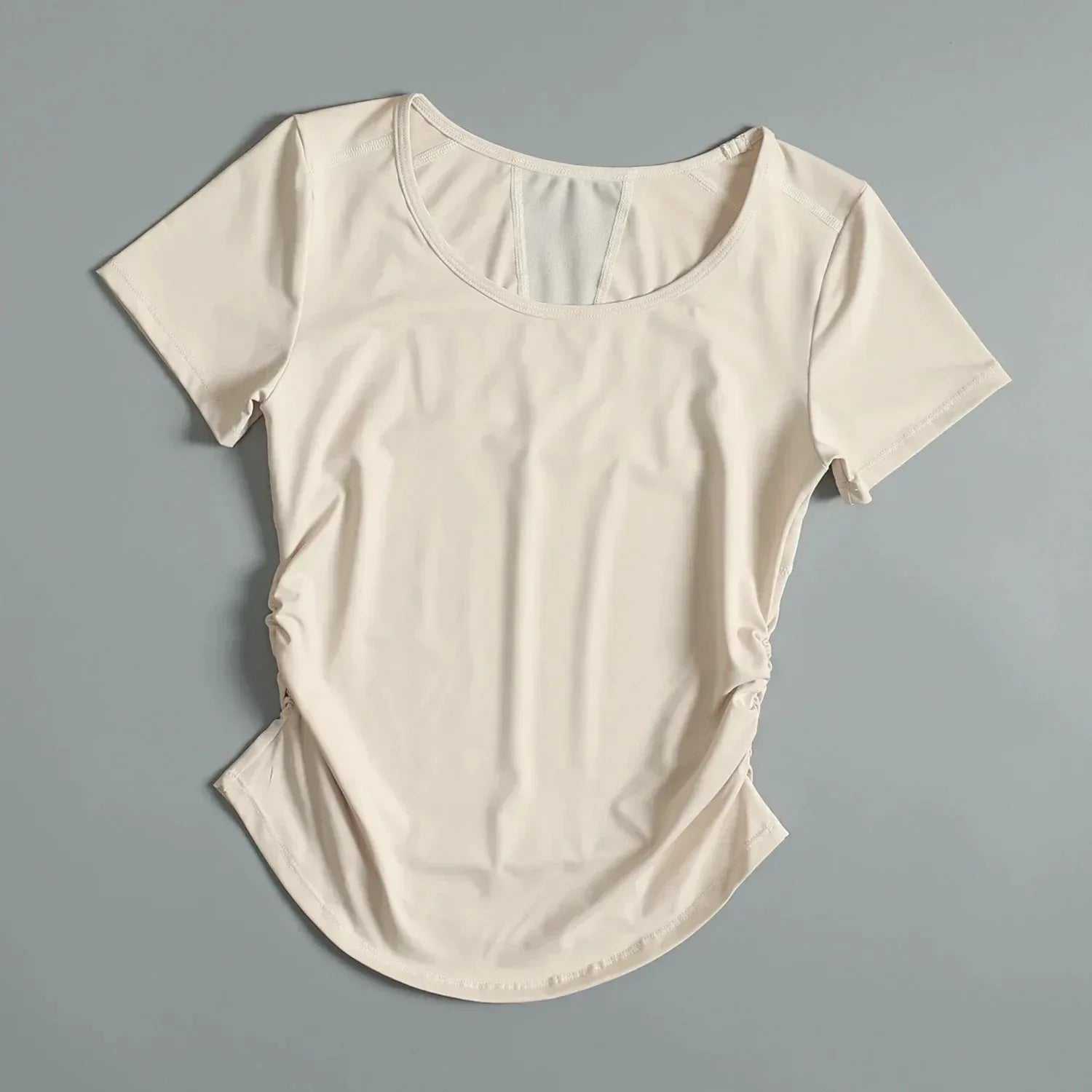 Beige t-shirt on a gray background