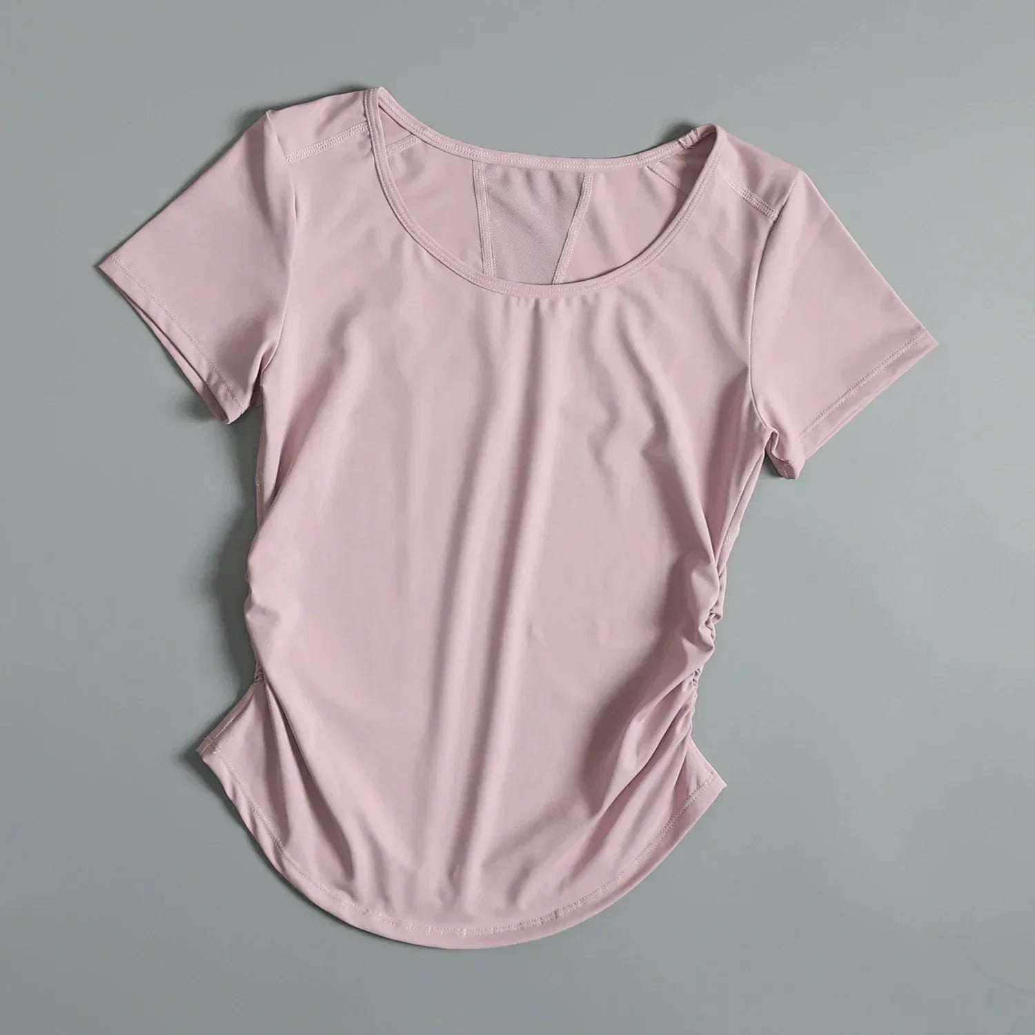 Pink t-shirt on a gray background