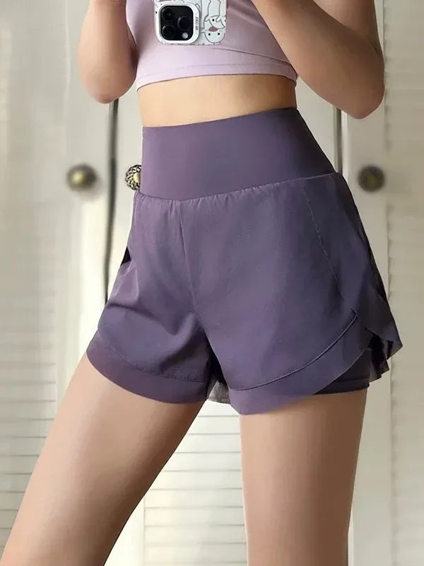 purple Front view of women’s 2-in-1 running shorts showing the breathable outer layer and high-waisted fit - BetterPlace