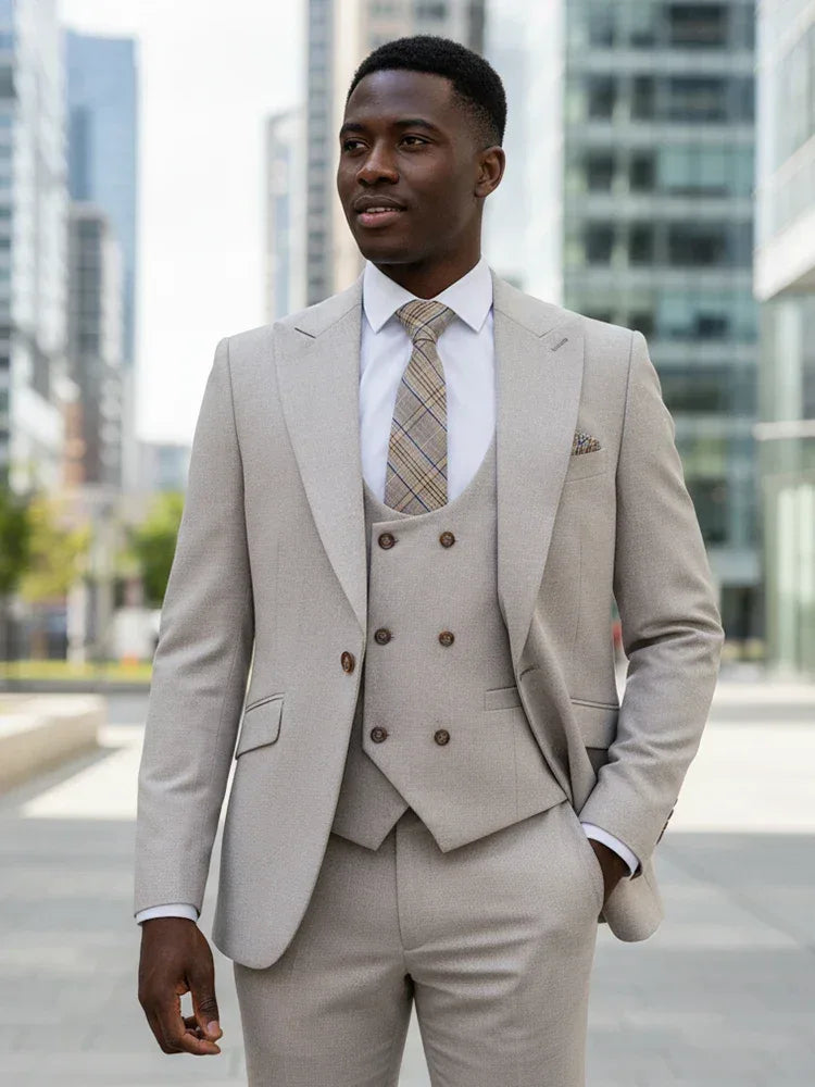A man wearing a modern tailored suit made from lightweight, four-season fabric suitable for office wear or social events. - BetterPlace