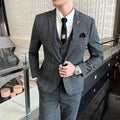 Full front view of a versatile four-season men's 3-piece suit featuring a tailored knit blazer, matching vest, and slim fit trousers. - BetterPlace