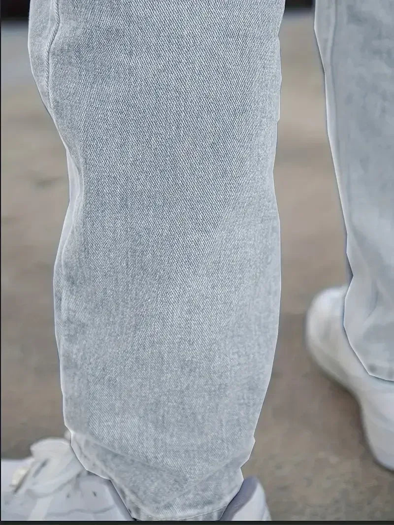 Close-up of light gray pants on a blurred background - Vintage Indigo Wash