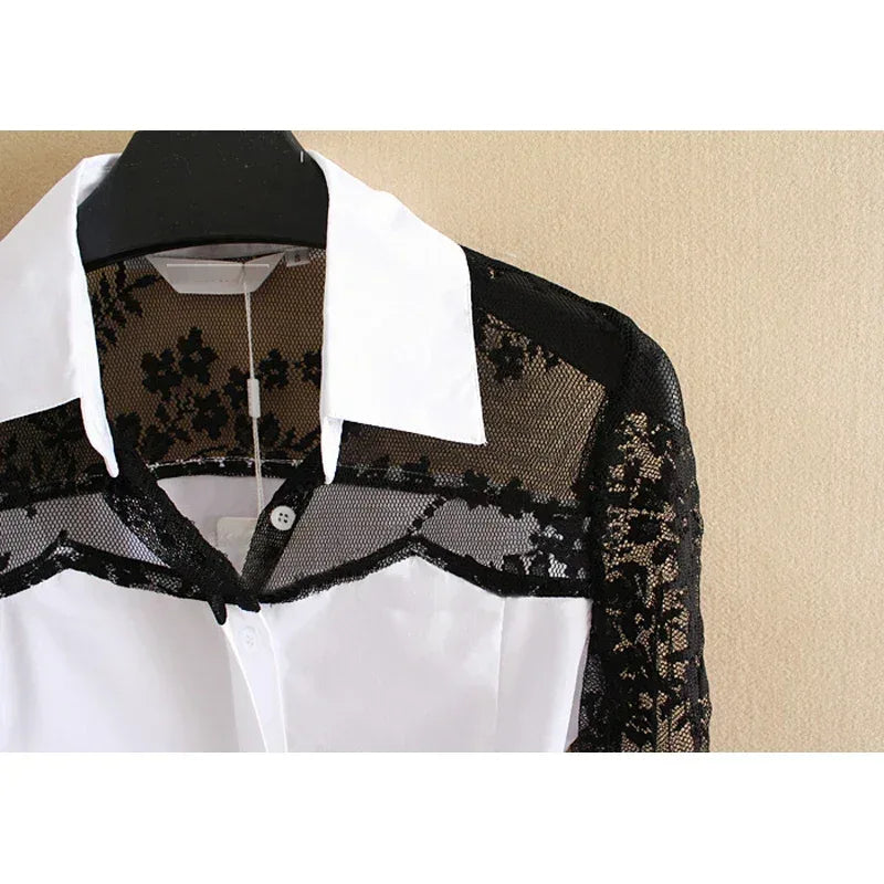 White shirt with black lace trim on a beige background