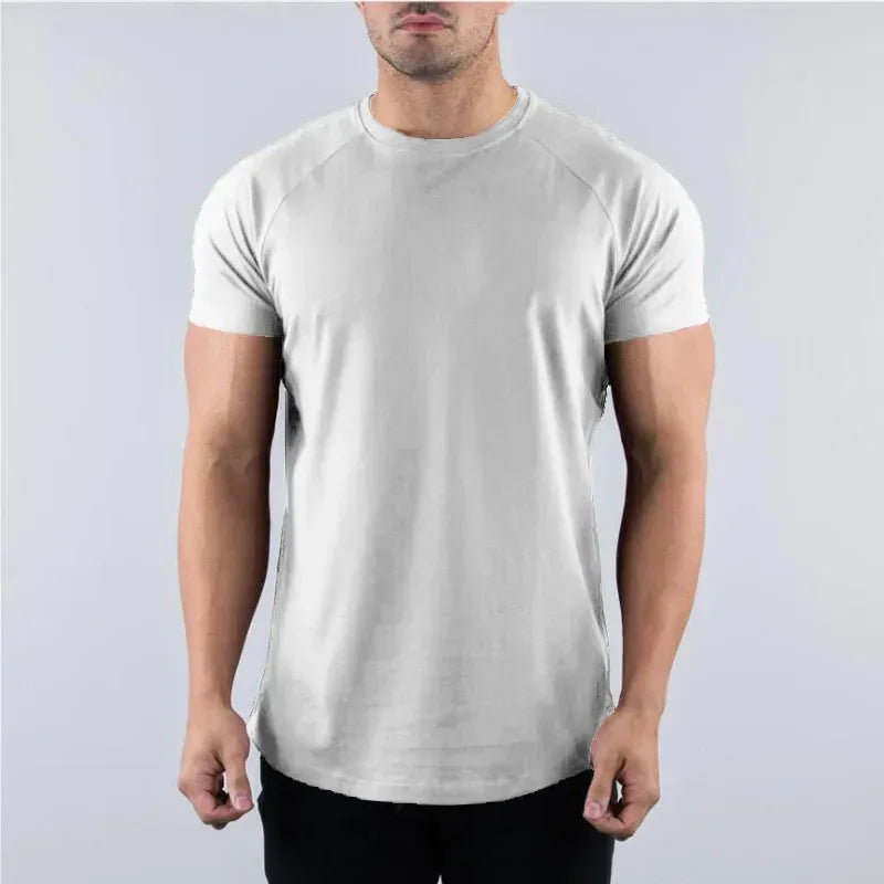 white Front view of a men’s slim fit cotton gym shirt featuring a tapered athletic cut and soft-touch fabric.- BetterPlace