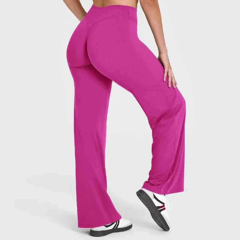 Back view of women's athletic set highlighting the waistband support and seamless finish fuschia - BetterPlace