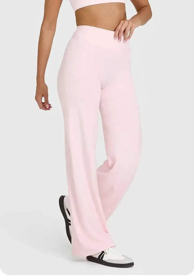 Front view of women's high-waisted fitness set showing the fit and v-neck design light pink - BetterPlace